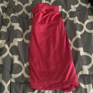 This a pink Xs tennis skirt! It’s hot pink and has the cutest ruffles!